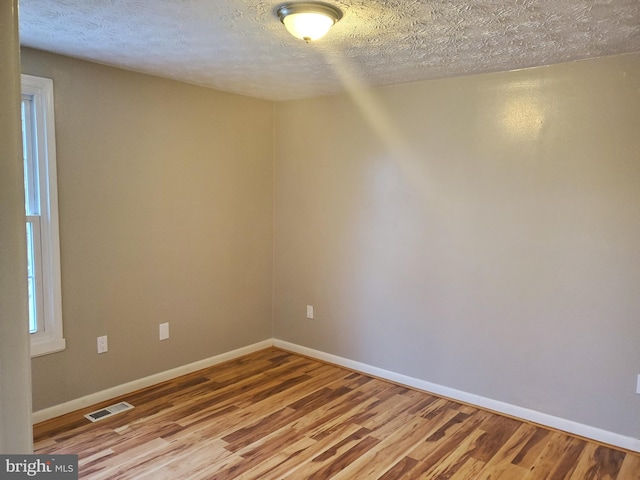 505 Northview Rd, Mount Airy, MD 21771 - unfurnished room featuring wood finished floors and a textured ceiling
