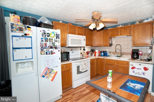 505 Northview Rd, Mount Airy, MD 21771 - kitchen with white appliances, tasteful backsplash, a ceiling fan, light countertops, and a textured ceiling