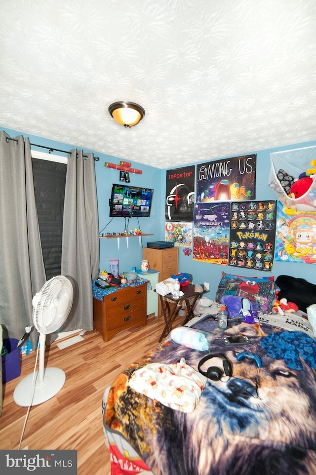 505 Northview Rd, Mount Airy, MD 21771 - bedroom featuring wood finished floors and a textured ceiling