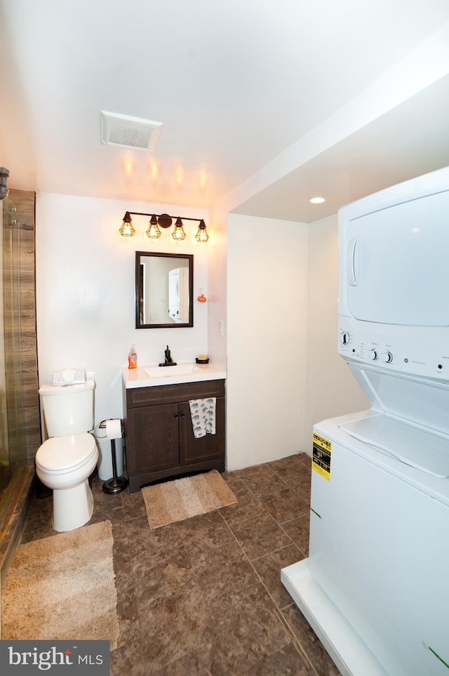 505 Northview Rd, Mount Airy, MD 21771 - full bathroom featuring stacked washer / dryer, vanity, and an enclosed shower