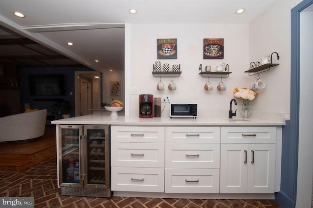 716 Old Fallston Rd, Fallston, MD 21047 - indoor dry bar featuring beverage cooler, brick patterned floors, and recessed lighting