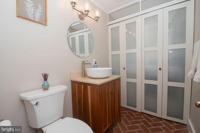 716 Old Fallston Rd, Fallston, MD 21047 - bathroom with brick floors, vanity, and a chandelier