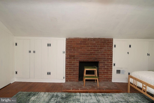 716 Old Fallston Rd, Fallston, MD 21047 - bedroom featuring hardwood / wood-style flooring, vaulted ceiling, a closet, and a decorative wall