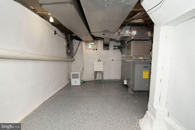 716 Old Fallston Rd, Fallston, MD 21047 - below grade area with heating unit and a sink