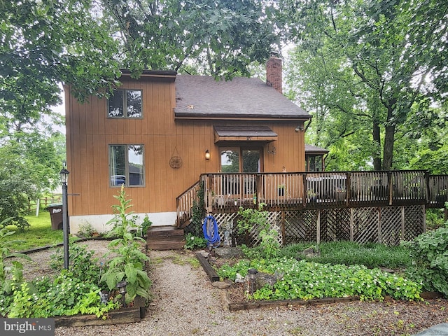 27 Gladys Trl, Fairfield, PA 17320 - rear view of property featuring a chimney, a wooden deck, and roof with shingles