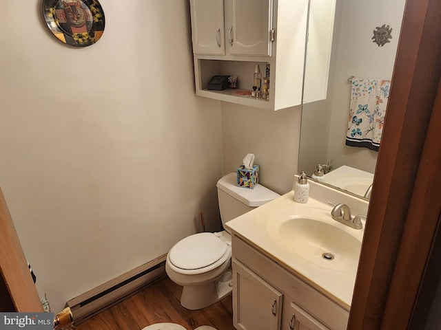 27 Gladys Trl, Fairfield, PA 17320 - bathroom with a baseboard heating unit, vanity, and wood finished floors