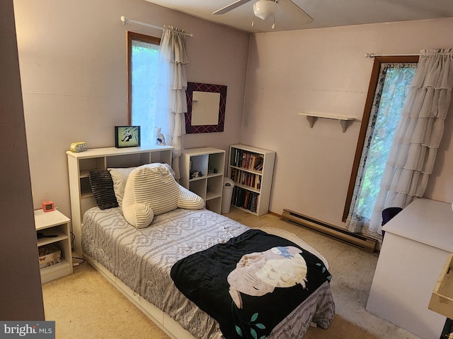 27 Gladys Trl, Fairfield, PA 17320 - carpeted bedroom featuring a baseboard heating unit and a ceiling fan