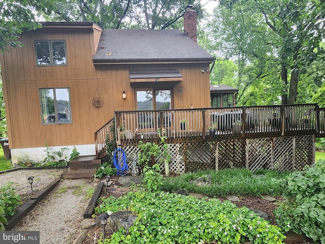 27 Gladys Trl, Fairfield, PA 17320 - back of house featuring a shingled roof, a chimney, and a wooden deck