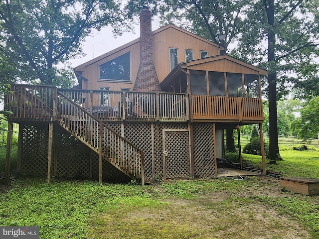 27 Gladys Trl, Fairfield, PA 17320 - back of property with a sunroom, a deck, a chimney, stairway, and a lawn
