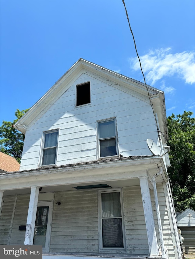 702 Hughlett St, Cambridge, MD 21613 - view of home's exterior featuring a porch
