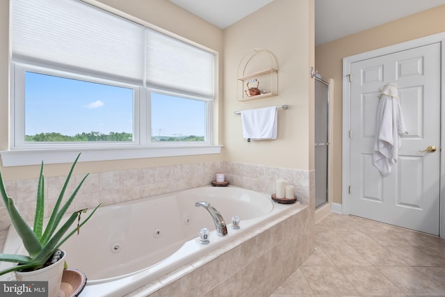 694 Ridge Rd, Telford, PA 18969 - bathroom with a whirlpool tub, a shower stall, plenty of natural light, and tile patterned floors