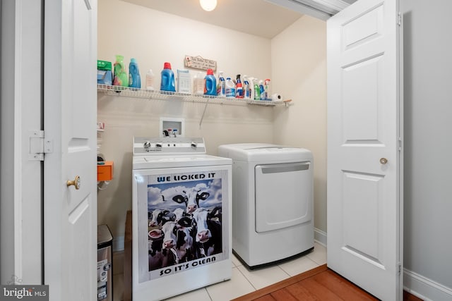 694 Ridge Rd, Telford, PA 18969 - washroom with washing machine and dryer and light tile patterned floors