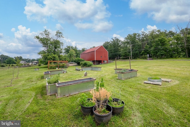 694 Ridge Rd, Telford, PA 18969 - view of green lawn with a garden, an outbuilding, and a barn