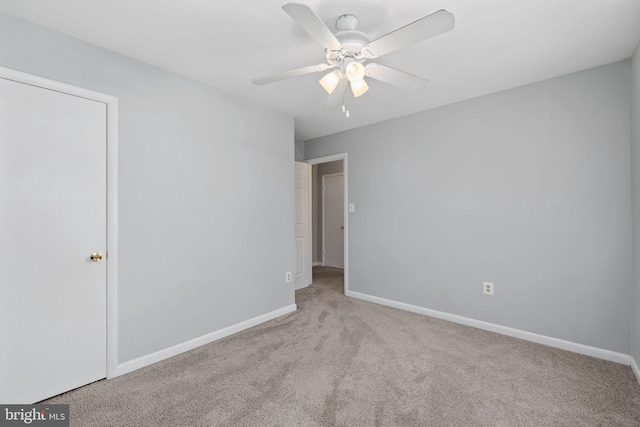 14361 Springbrook Ct, Woodbridge, VA 22193 - carpeted spare room with baseboards and ceiling fan