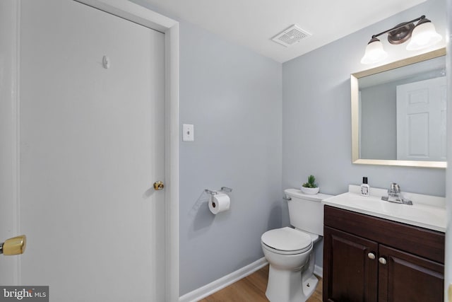 14361 Springbrook Ct, Woodbridge, VA 22193 - half bath with vanity and wood finished floors
