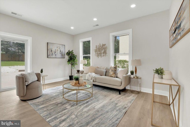 9204 Douglas St, Manassas, VA 20110 - living area with wood finished floors and recessed lighting