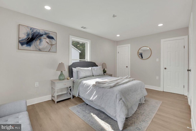 9204 Douglas St, Manassas, VA 20110 - bedroom featuring light wood-style floors and recessed lighting