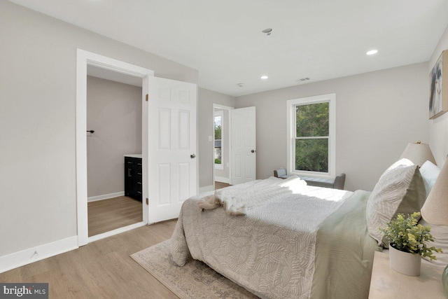 9204 Douglas St, Manassas, VA 20110 - bedroom featuring light wood-style floors and recessed lighting
