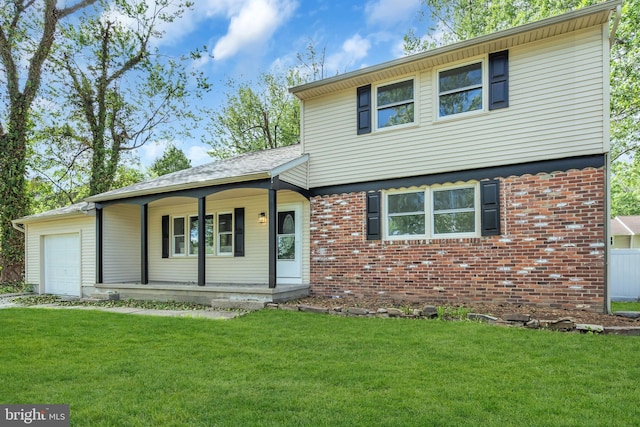125 Walt Whitman Blvd, Cherry Hill, NJ 08003 - colonial-style house featuring a porch, a garage, a front lawn, and brick siding