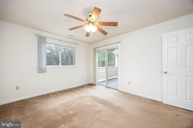 753 Canvasback Ct Unit 204, Salisbury, MD 21804 - unfurnished bedroom with access to outside, carpet flooring, a textured ceiling, and ceiling fan