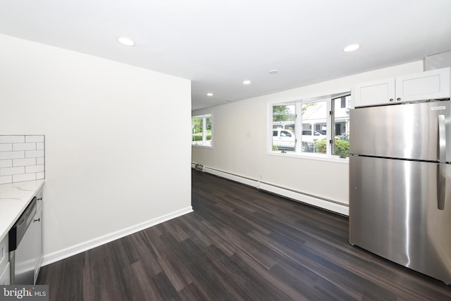 106 N Warminster Rd, Hatboro, PA 19040 - kitchen with stainless steel appliances, a baseboard radiator, dark wood-style floors, recessed lighting, and light stone countertops