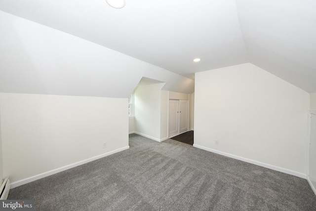 106 N Warminster Rd, Hatboro, PA 19040 - additional living space with vaulted ceiling, dark carpet, recessed lighting, and a baseboard radiator