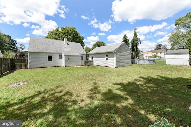 106 N Warminster Rd, Hatboro, PA 19040 - back of property featuring a fenced backyard and an outbuilding