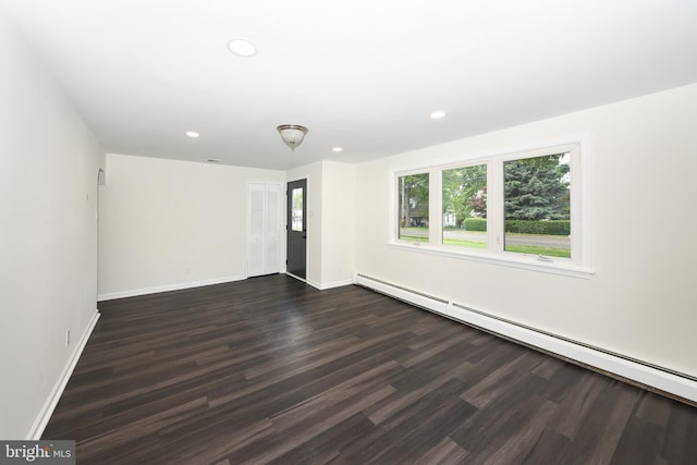 106 N Warminster Rd, Hatboro, PA 19040 - unfurnished room featuring a baseboard radiator, recessed lighting, and dark wood-style floors
