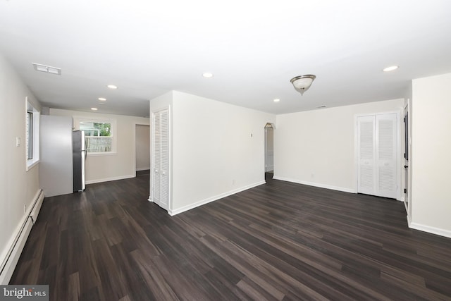 106 N Warminster Rd, Hatboro, PA 19040 - unfurnished room featuring baseboard heating, dark wood-style flooring, and recessed lighting