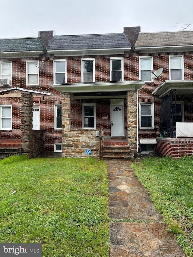 3720 Brooklyn, Baltimore, MD 21225 - multi unit property with a front yard, brick siding, a shingled roof, cooling unit, and mansard roof