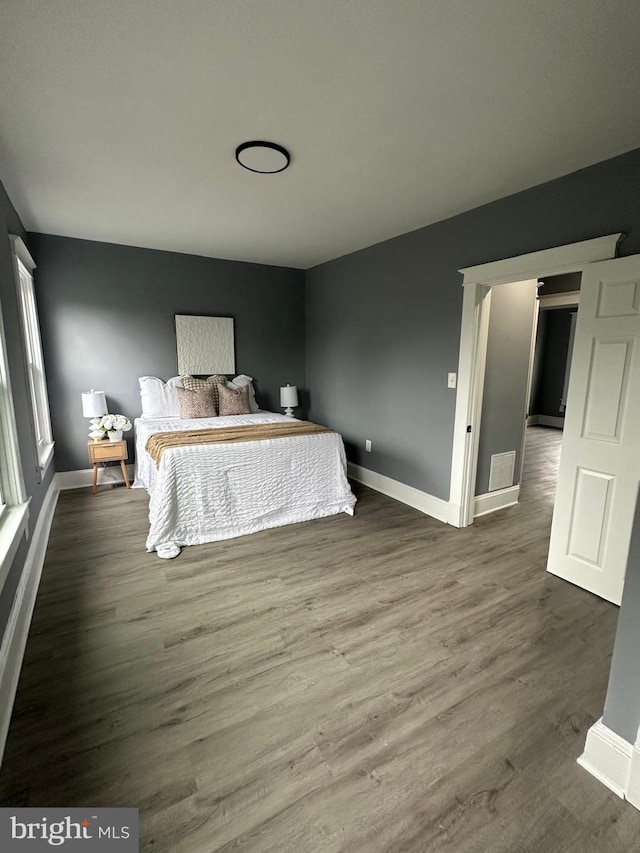 3720 Brooklyn, Baltimore, MD 21225 - bedroom with baseboards and wood finished floors