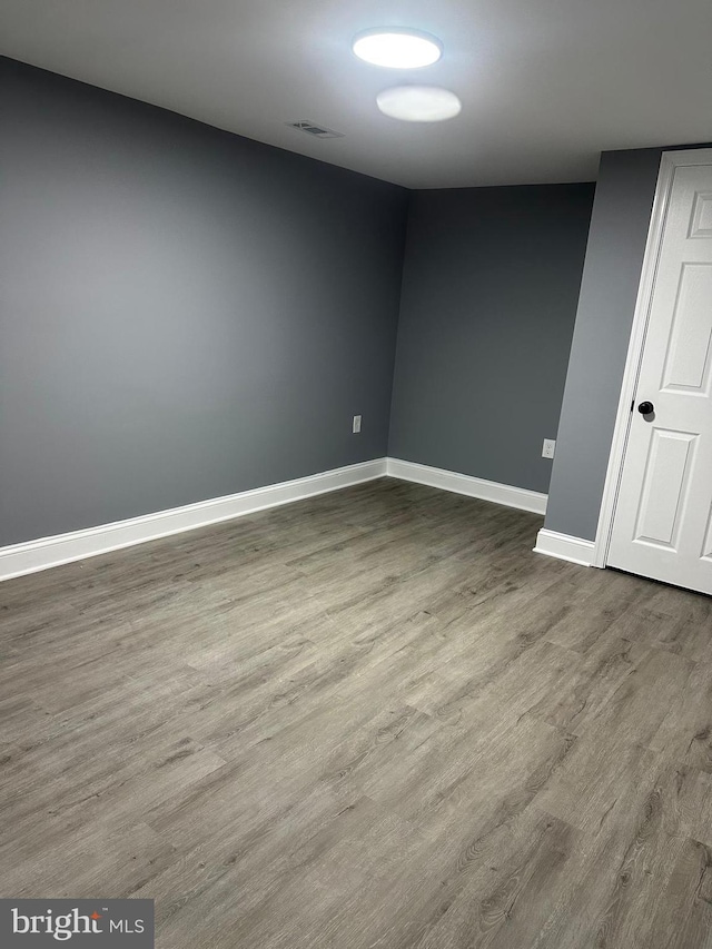 3720 Brooklyn, Baltimore, MD 21225 - unfurnished room featuring baseboards and wood finished floors