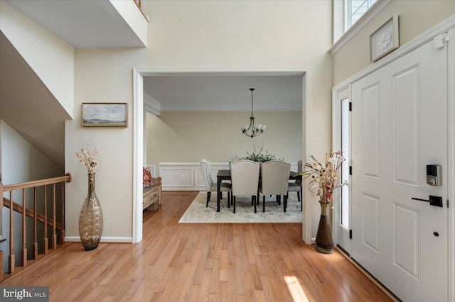35 Gallery Rd, Stafford, VA 22554 - foyer featuring light wood-style flooring, ornamental molding, and a chandelier