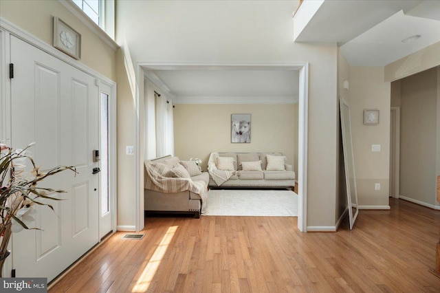 35 Gallery Rd, Stafford, VA 22554 - entrance foyer featuring light wood-style floors and crown molding