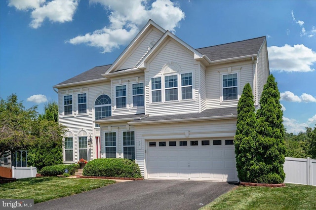 35 Gallery Rd, Stafford, VA 22554 - view of front of house featuring a garage and asphalt driveway