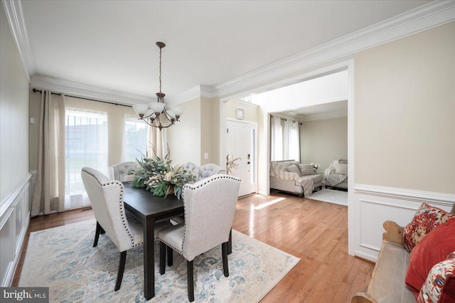 35 Gallery Rd, Stafford, VA 22554 - dining area with a chandelier, ornamental molding, healthy amount of natural light, light wood finished floors, and wainscoting