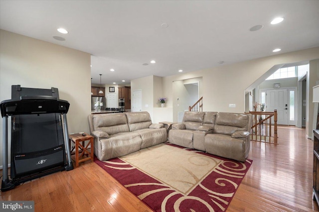 35 Gallery Rd, Stafford, VA 22554 - living area with light wood finished floors, stairs, and recessed lighting