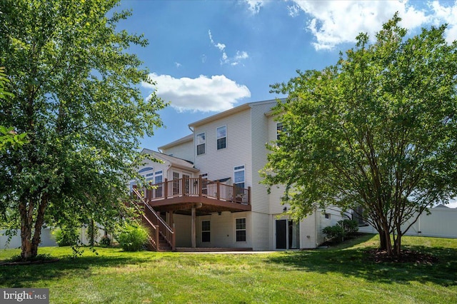 35 Gallery Rd, Stafford, VA 22554 - back of house with a deck, stairway, and a yard