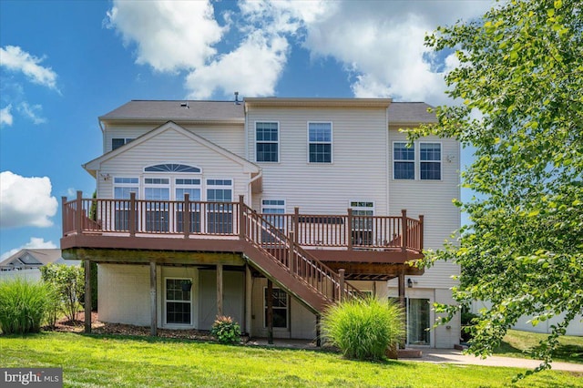 35 Gallery Rd, Stafford, VA 22554 - rear view of house with a wooden deck, a lawn, and stairway