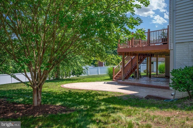 35 Gallery Rd, Stafford, VA 22554 - fenced backyard featuring a patio, a wooden deck, and stairway