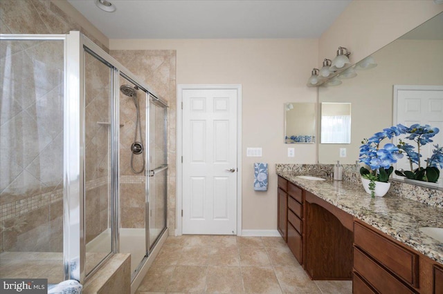 35 Gallery Rd, Stafford, VA 22554 - full bath with double vanity, a shower stall, and tile patterned flooring