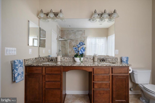 35 Gallery Rd, Stafford, VA 22554 - full bathroom featuring a stall shower, double vanity, and tile patterned floors