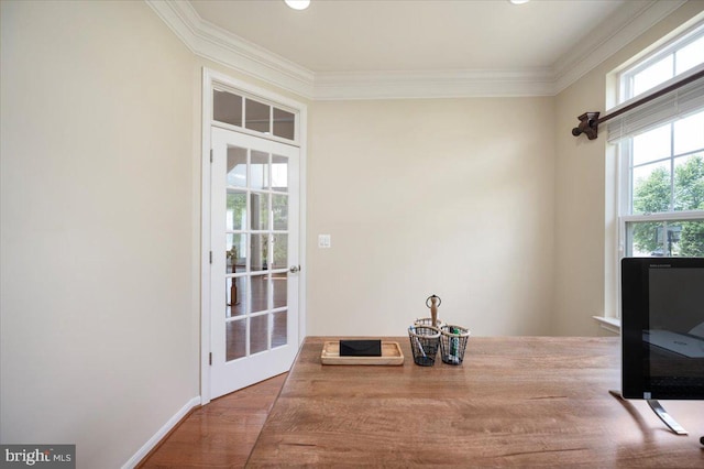35 Gallery Rd, Stafford, VA 22554 - unfurnished dining area featuring crown molding and wood finished floors