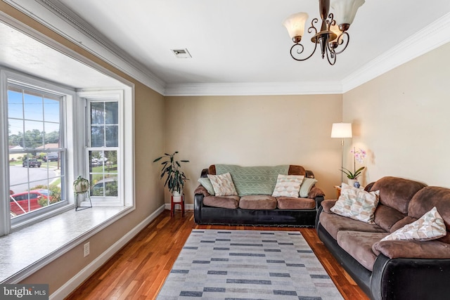1446 California St, Woodbridge, VA 22191 - living area with a chandelier, wood finished floors, and ornamental molding