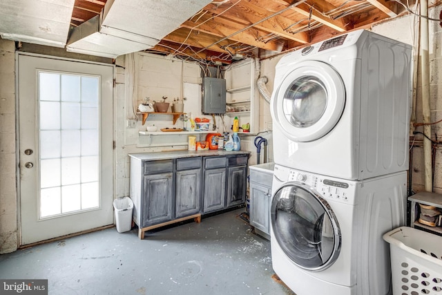 1446 California St, Woodbridge, VA 22191 - washroom featuring stacked washer / drying machine, electric panel, and cabinet space