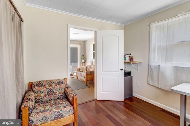 1446 California St, Woodbridge, VA 22191 - sitting room featuring dark wood-style flooring and ornamental molding