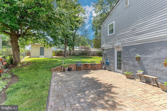 1446 California St, Woodbridge, VA 22191 - fenced backyard featuring a patio area and a shed