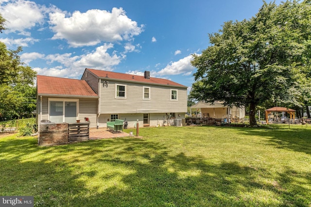 1446 California St, Woodbridge, VA 22191 - rear view of house with a chimney and a gazebo