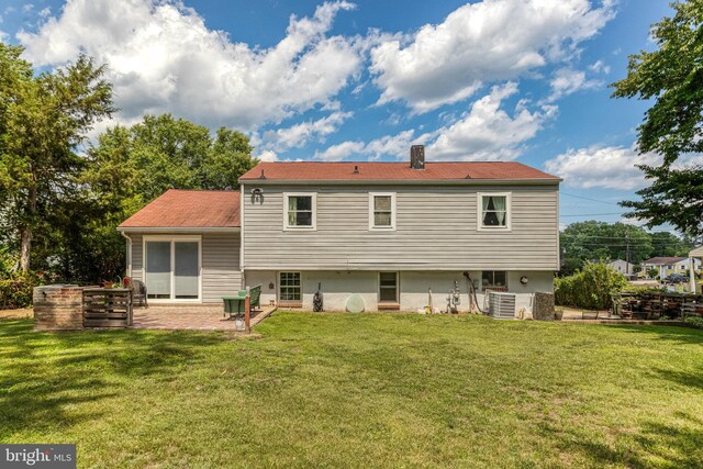 1446 California St, Woodbridge, VA 22191 - back of house with a patio area, a yard, and a chimney