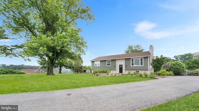 18747 Five Forks Rd, Stewartstown, PA 17363 - raised ranch with a chimney and a front lawn